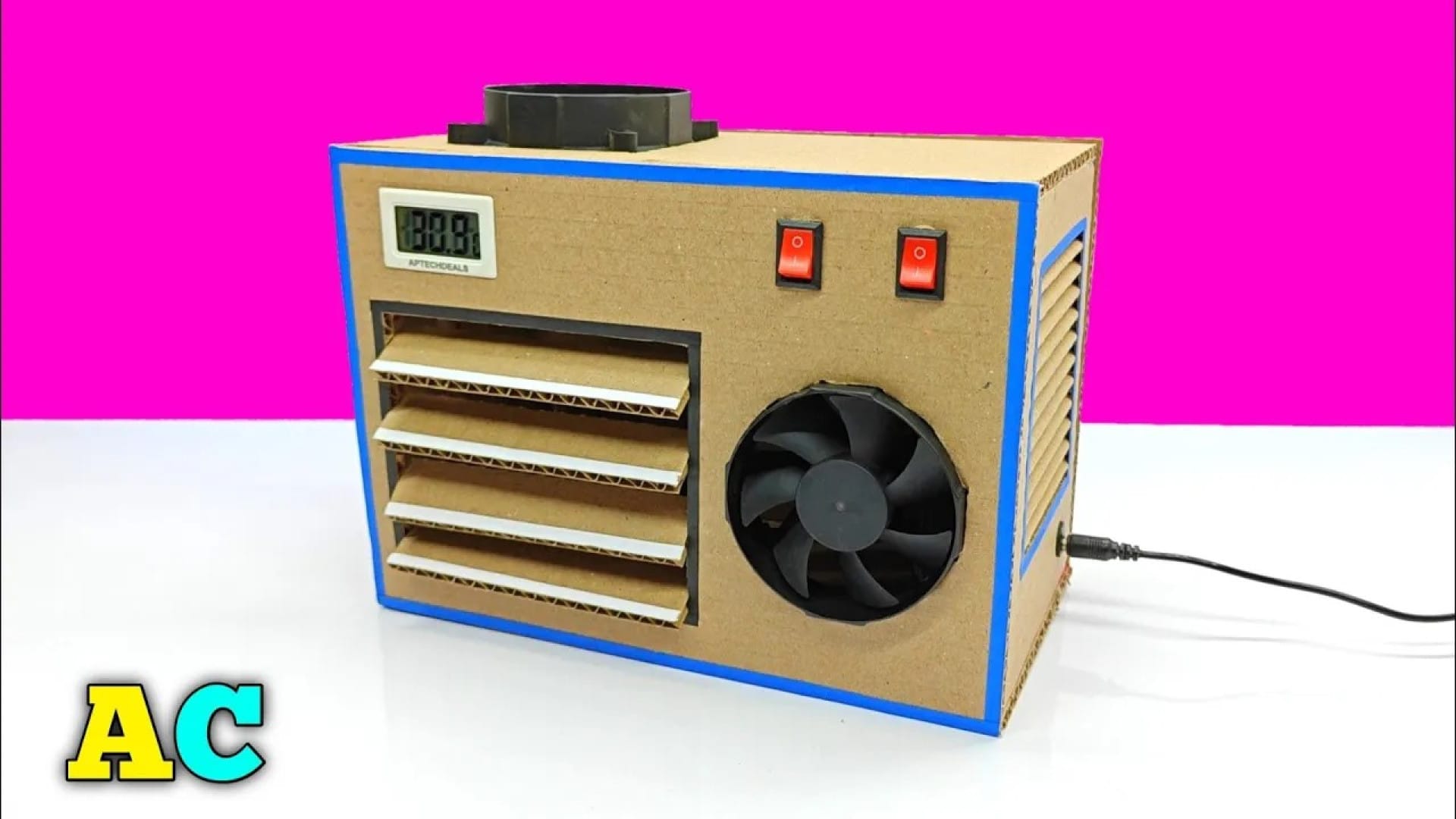 ساخت کاردستی کولر با مقوا؛ کولر کاردستی کوچک ساخته شده از کارتون، فن و قطعات ساده مناسب برای پروژه علمی کودکان