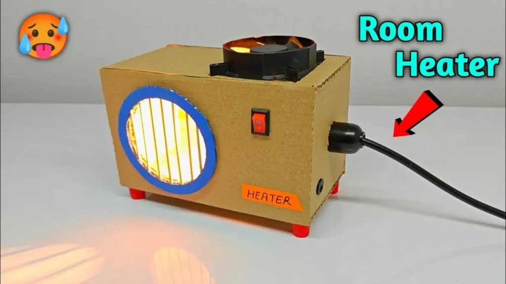 کاردستی بخاری برقی رومیزی دست‌ساز با بدنه مقوایی، فن خنک‌کننده و نور زرد شبیه‌سازی حرارت