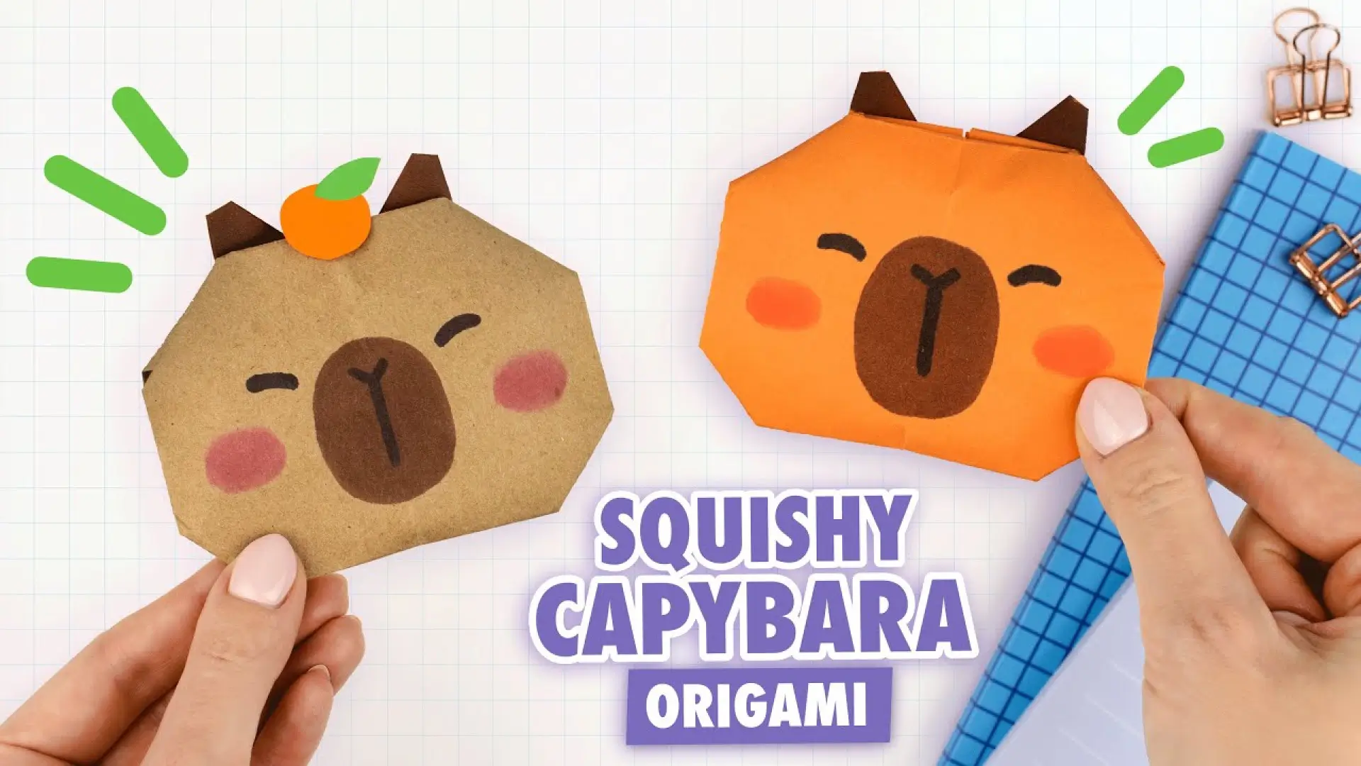 دو اسکوییشی (فیجت) کاغذی دست‌ساز به شکل صورت کاپی بارا که با هنر اوریگامی ساخته شده و چهره‌های بامزه‌ای روی آن‌ها نقاشی شده است.