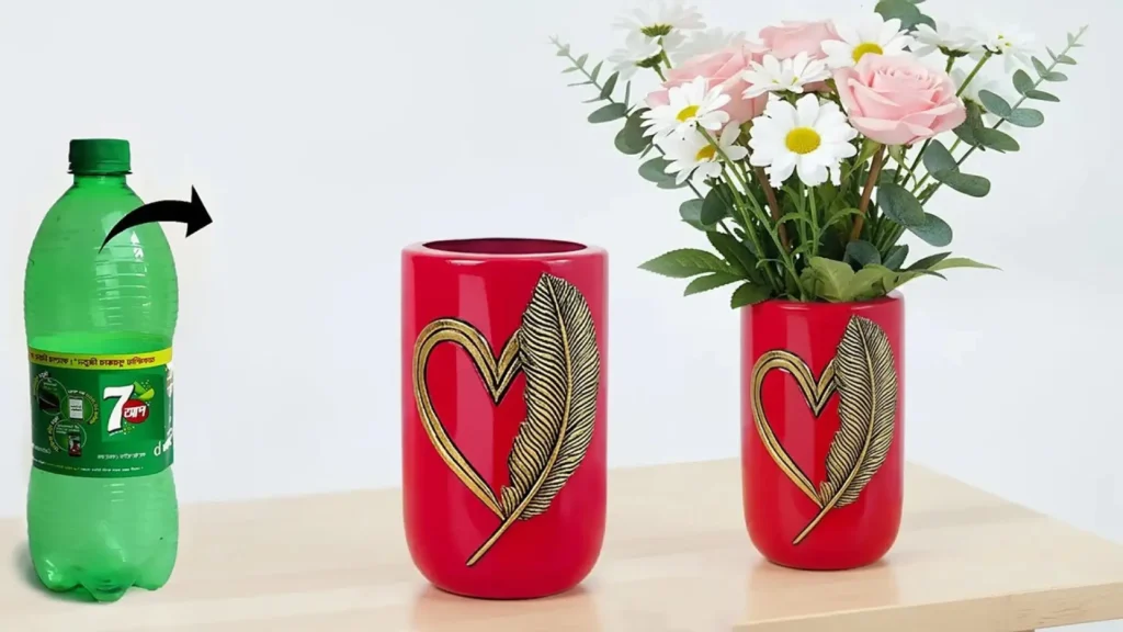 تبدیل بطری سبز نوشابه به گلدان استوانه‌ای قرمز رنگ با طرح برجسته قلب و پر طلایی